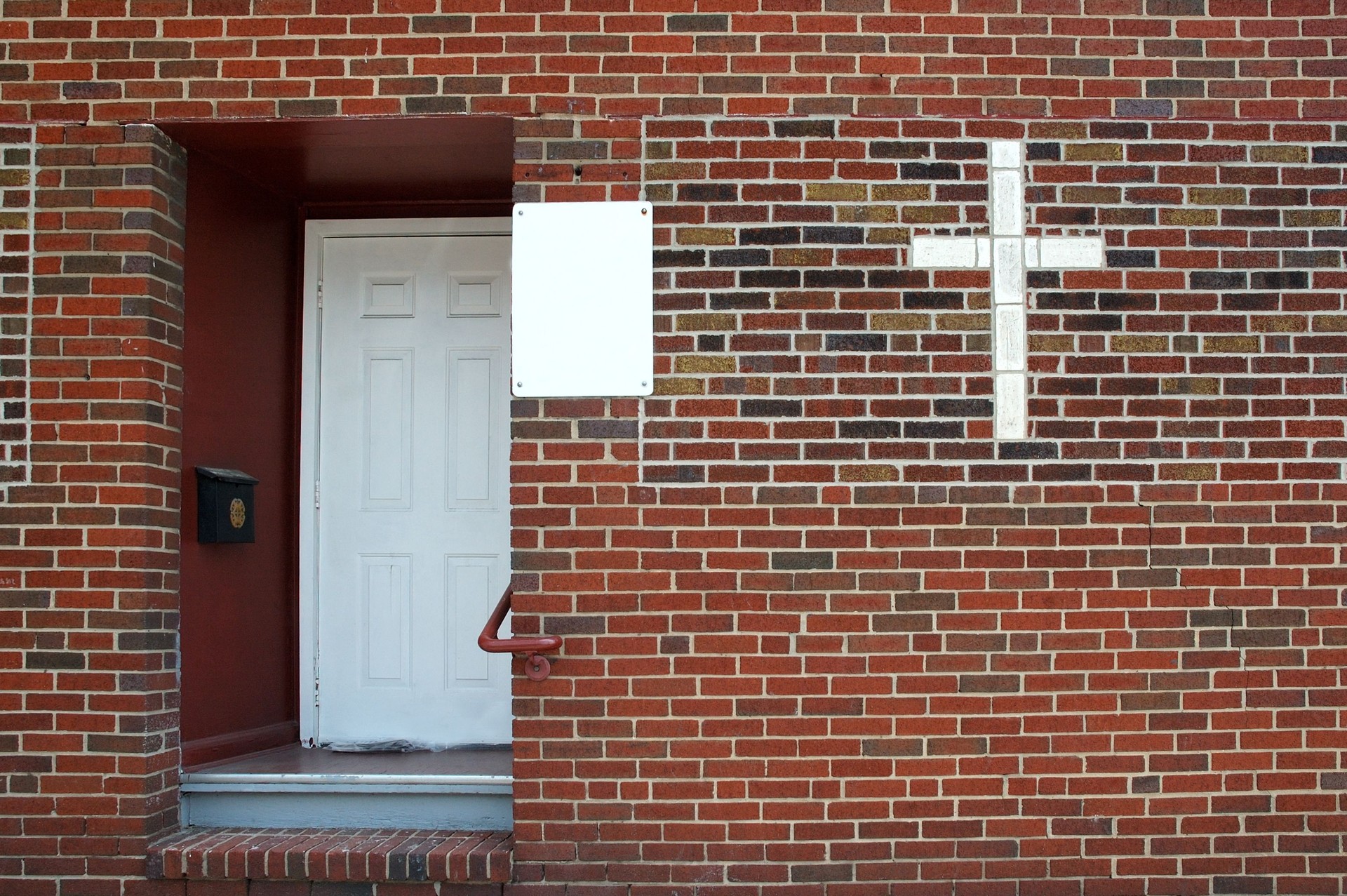 White Cross on Urban Brick Church